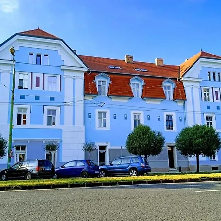 Blue House And Parking *